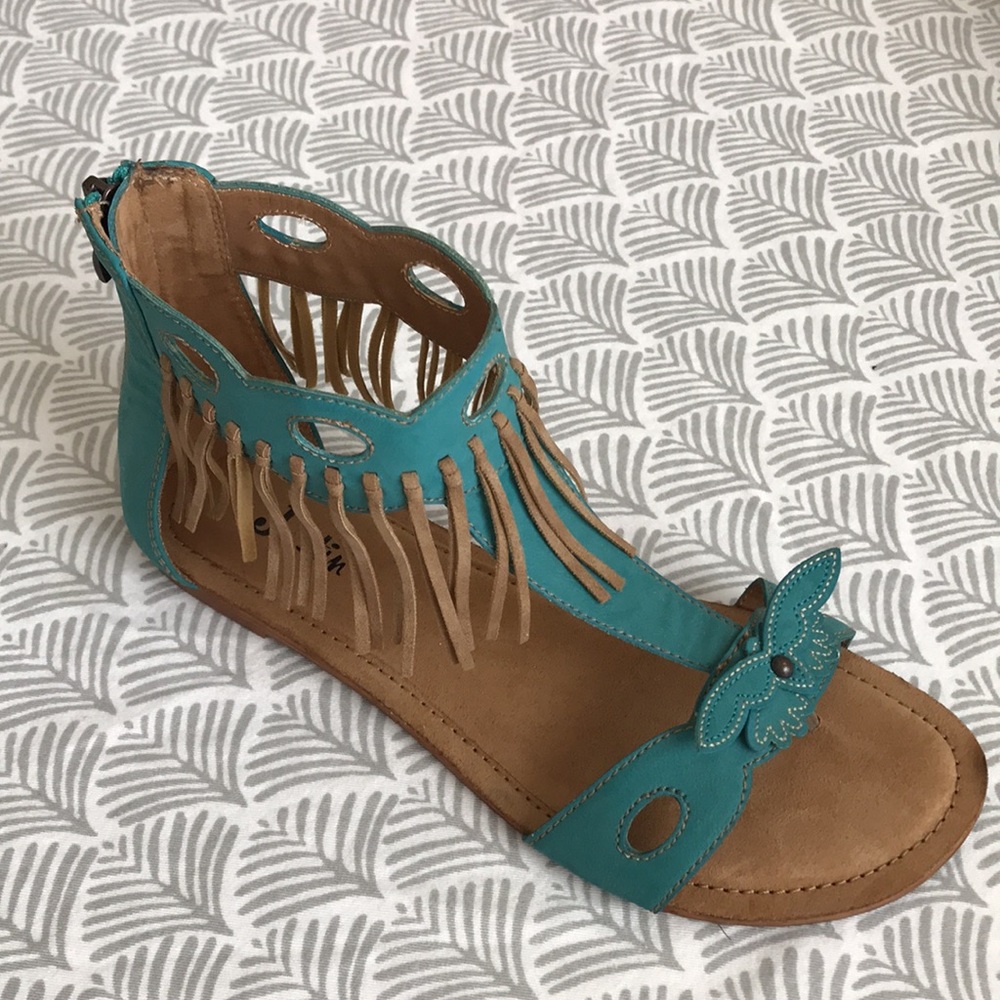 Justin turquoise colored  sandals with ankle fringe and back zipper